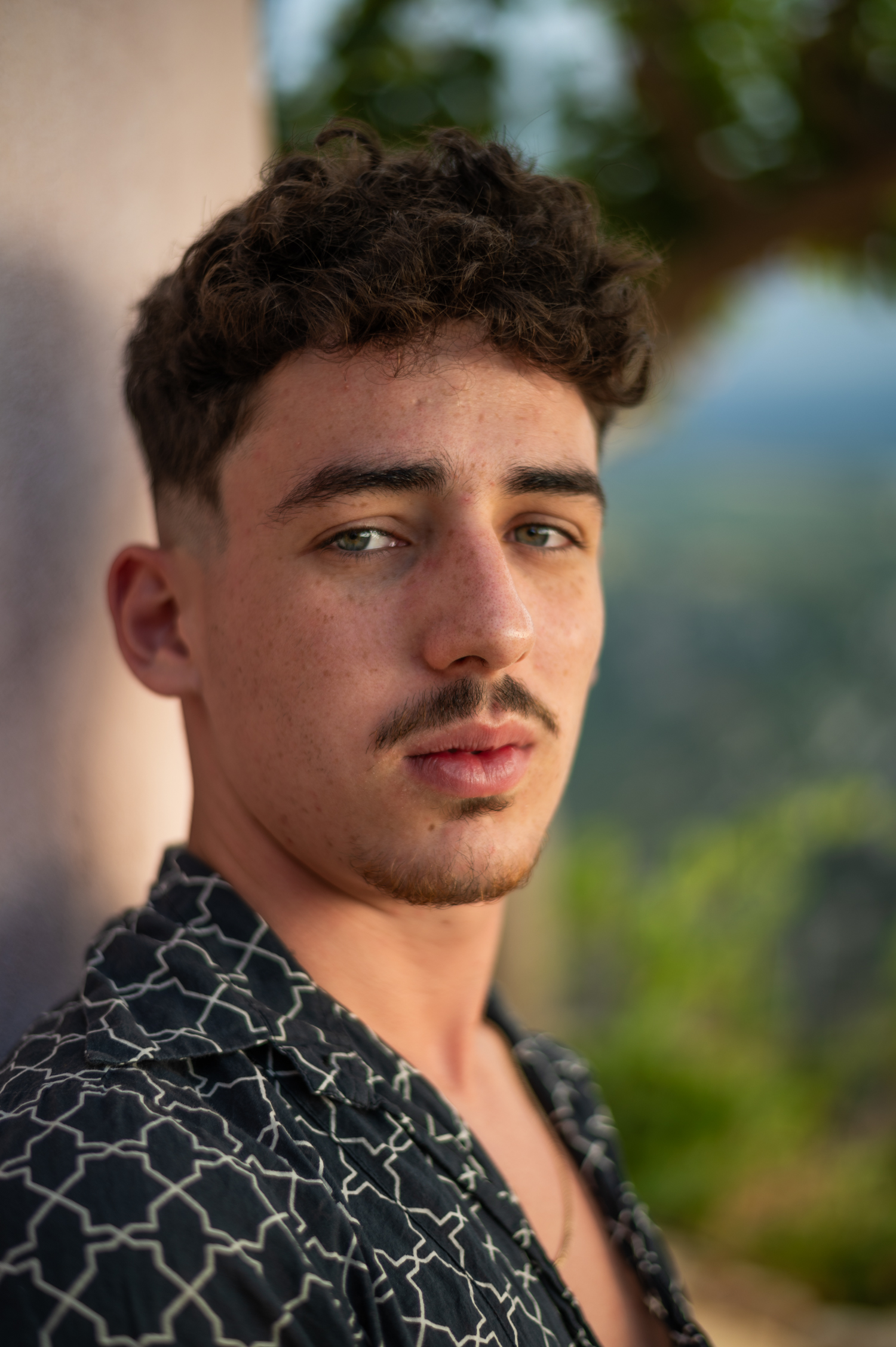 Close portrait against a white wall, Crete