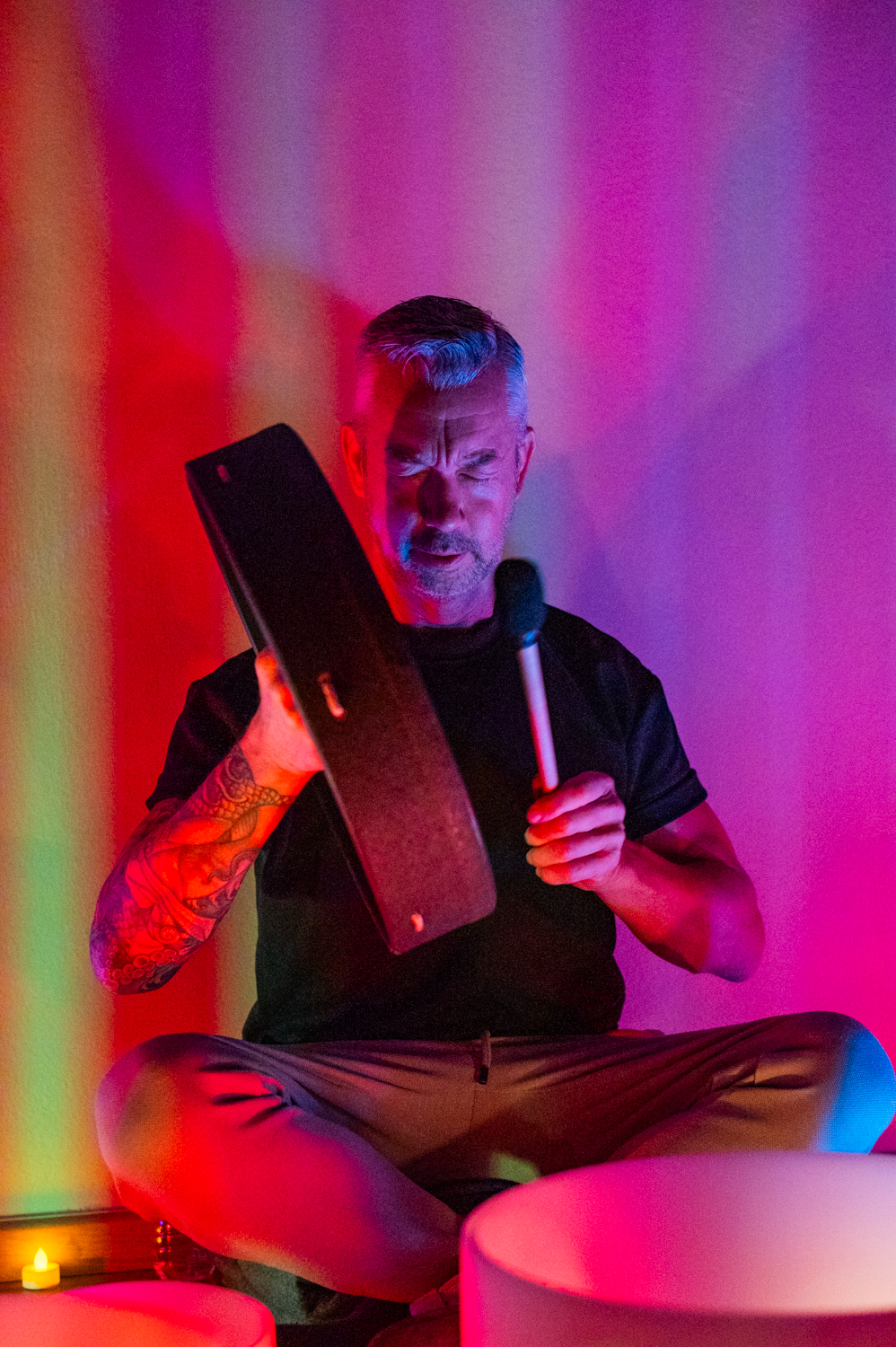 Sound practitioner portrait in coloured light, London